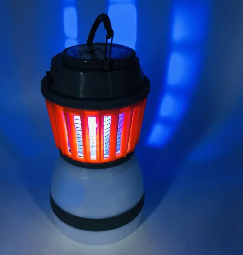 Solar mosquito lamp IPX6 waterproof with ABS housing, 16.5cm height, and 2200MAH battery on a camping table