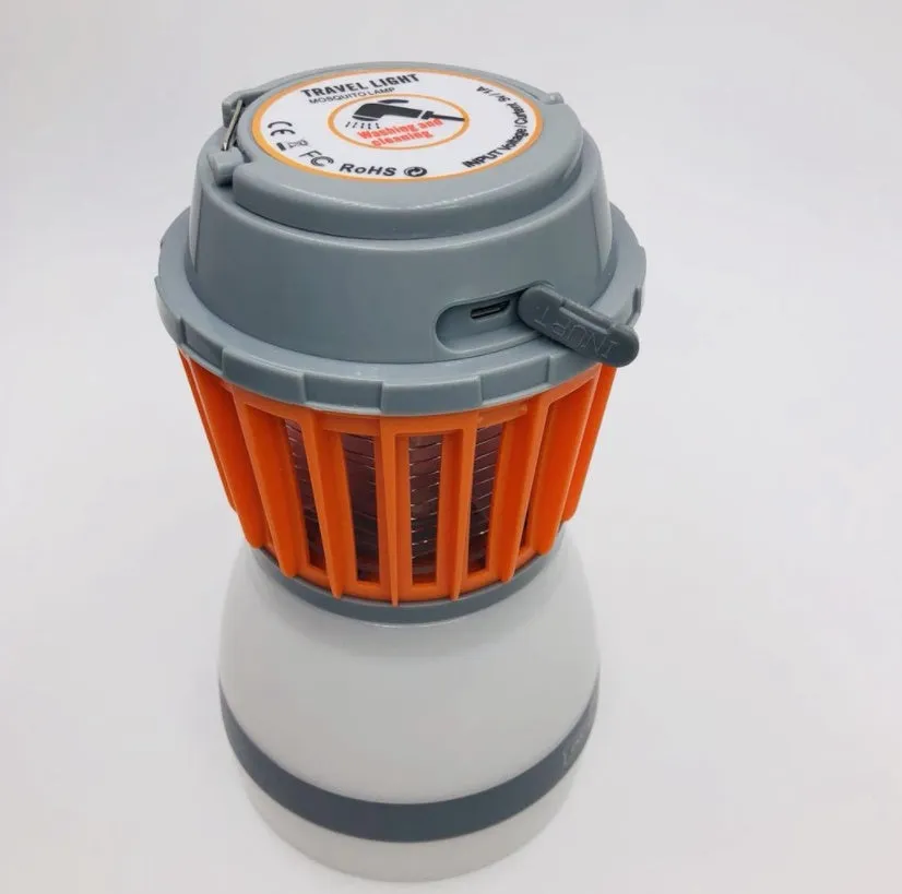 Solar mosquito lamp IPX6 waterproof with ABS housing, 16.5cm height, and 2200MAH battery on a camping table