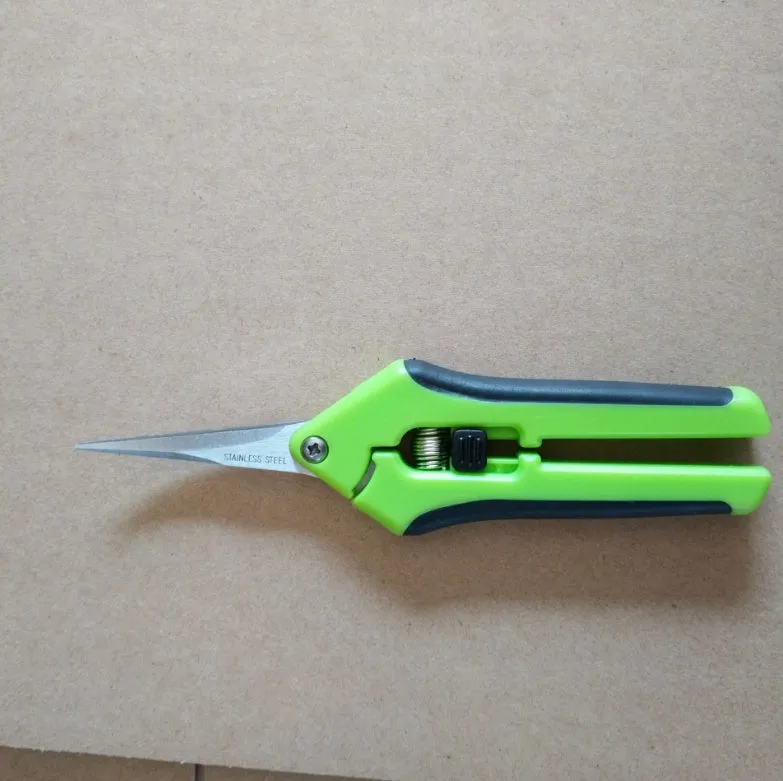 Green garden pruning scissors with stainless steel blade, 16.5 cm long, on a white background