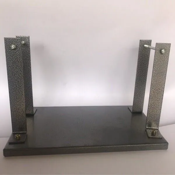 Black iron flip chip bracket accessory for mounting a portable electric planer.
