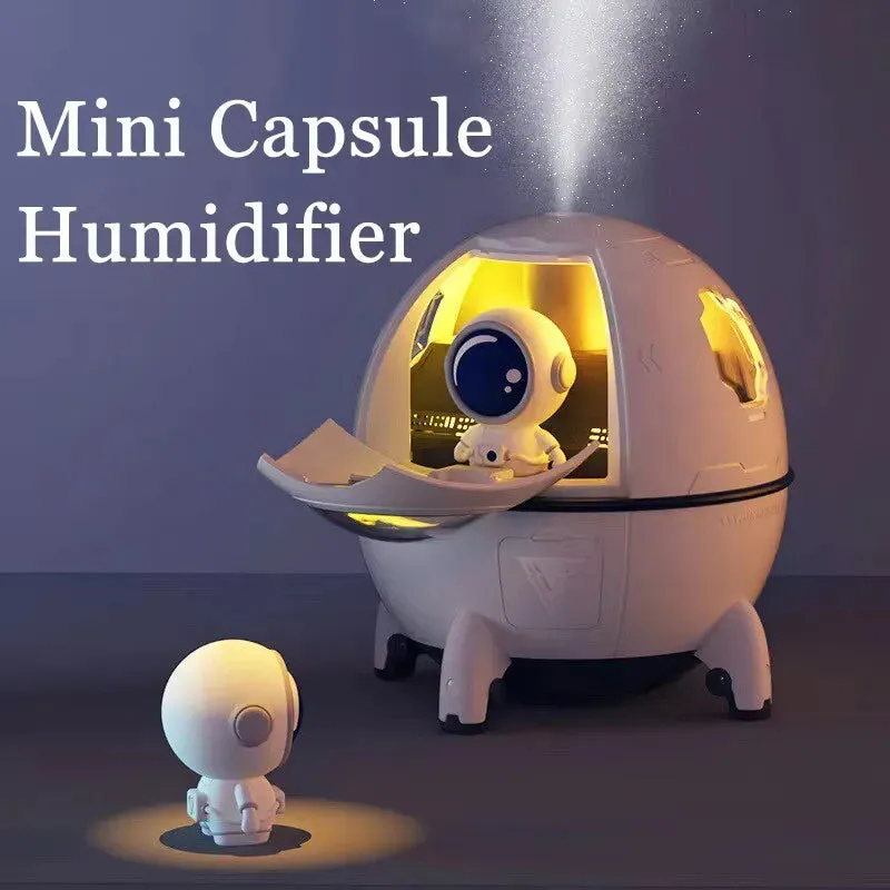 Astronaut-themed desktop USB humidifier with colourful LED light and 220ml water tank.