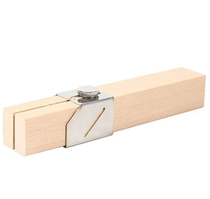 Plastic bottle cutter in log colour, 2.2x2.2x14cm, with slot for cutting PET bottles into rope