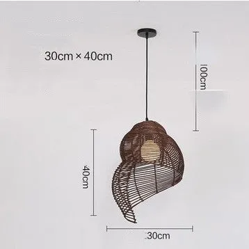 Snail-shaped rattan pendant light with woven grass and rattan shade, 350mm diameter, LED source, adjustable height, on a dark background