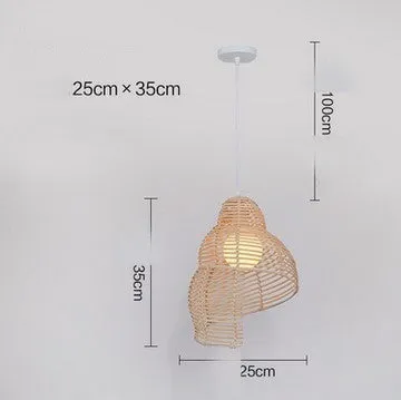 Snail-shaped rattan pendant light with woven grass and rattan shade, 350mm diameter, LED source, adjustable height, on a dark background