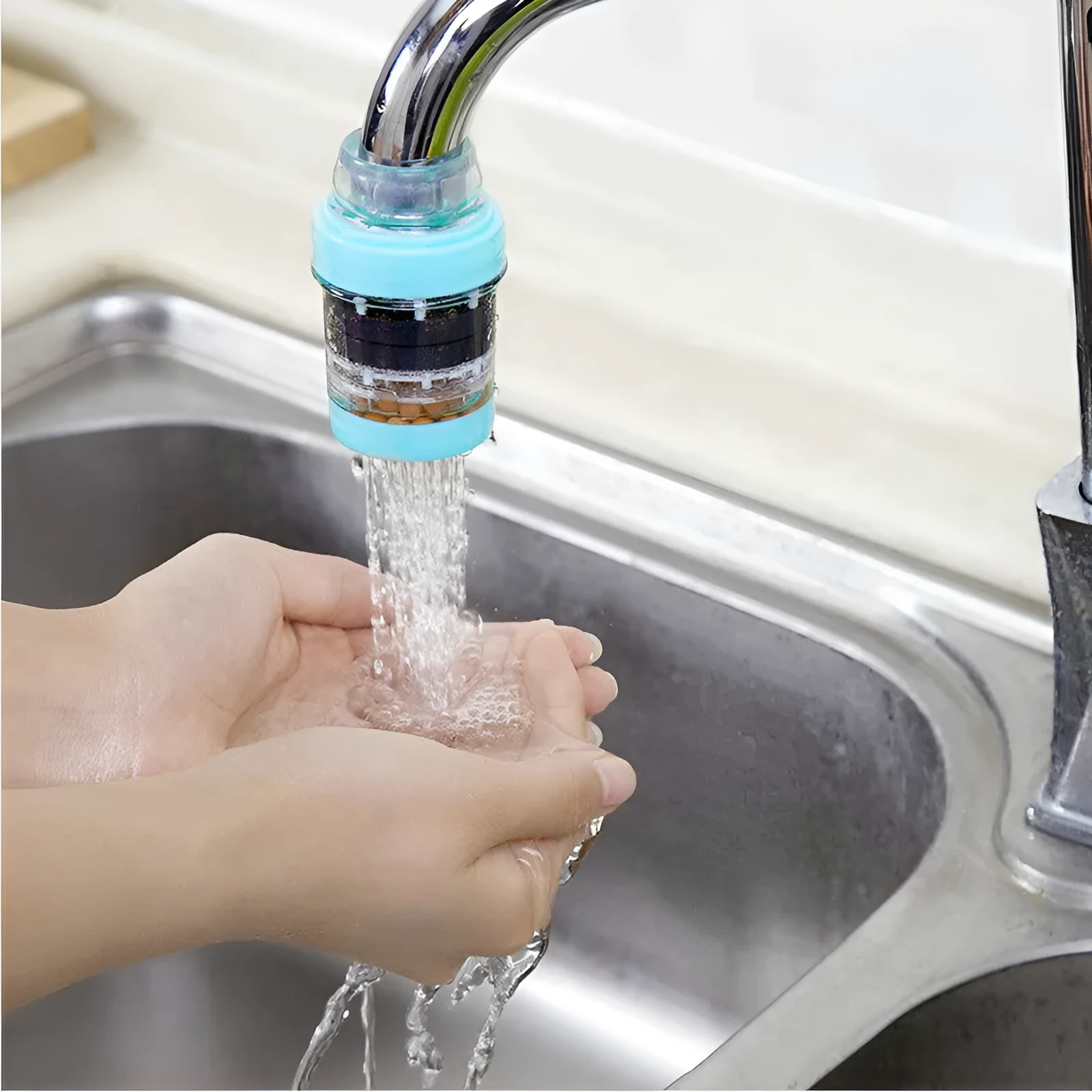 Wheat rice stone magnetized tap water filter for 16-19mm faucets in blue on kitchen tap