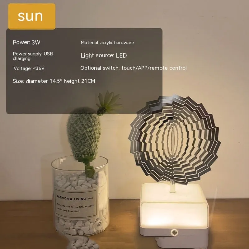 Creative rotating ambience LED night light with 16 colour remote control, acrylic and metal construction