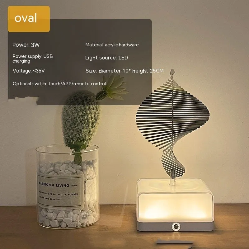 Creative rotating ambience LED night light with 16 colour remote control, acrylic and metal construction