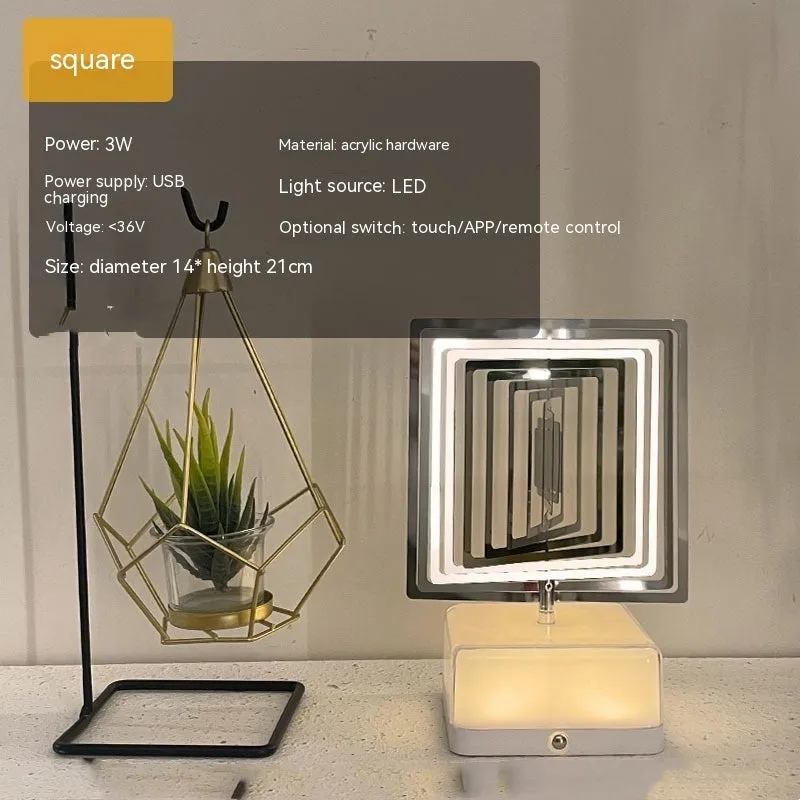 Creative rotating ambience LED night light with 16 colour remote control, acrylic and metal construction