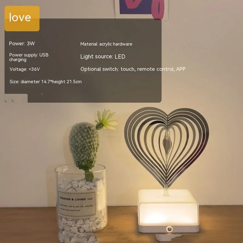 Creative rotating ambience LED night light with 16 colour remote control, acrylic and metal construction