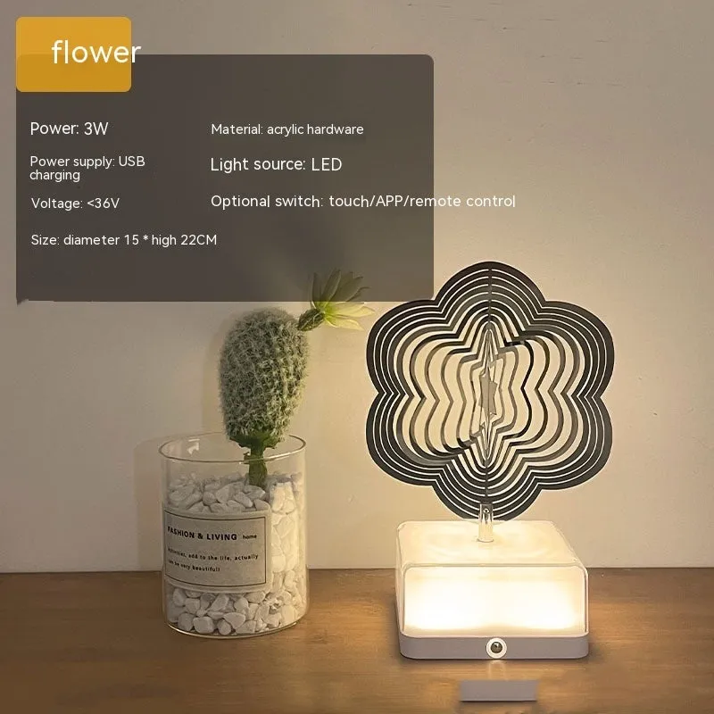 Creative rotating ambience LED night light with 16 colour remote control, acrylic and metal construction