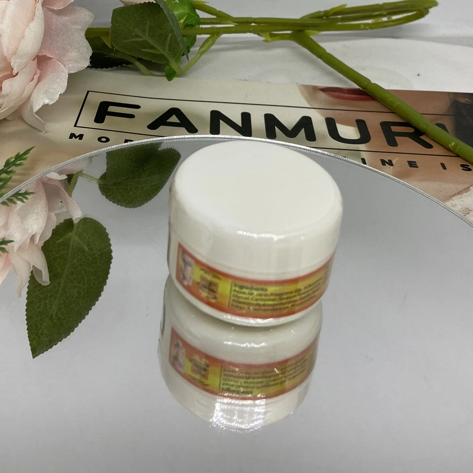 Ginger firming massage cream in a jar, 50g net content, photo colour