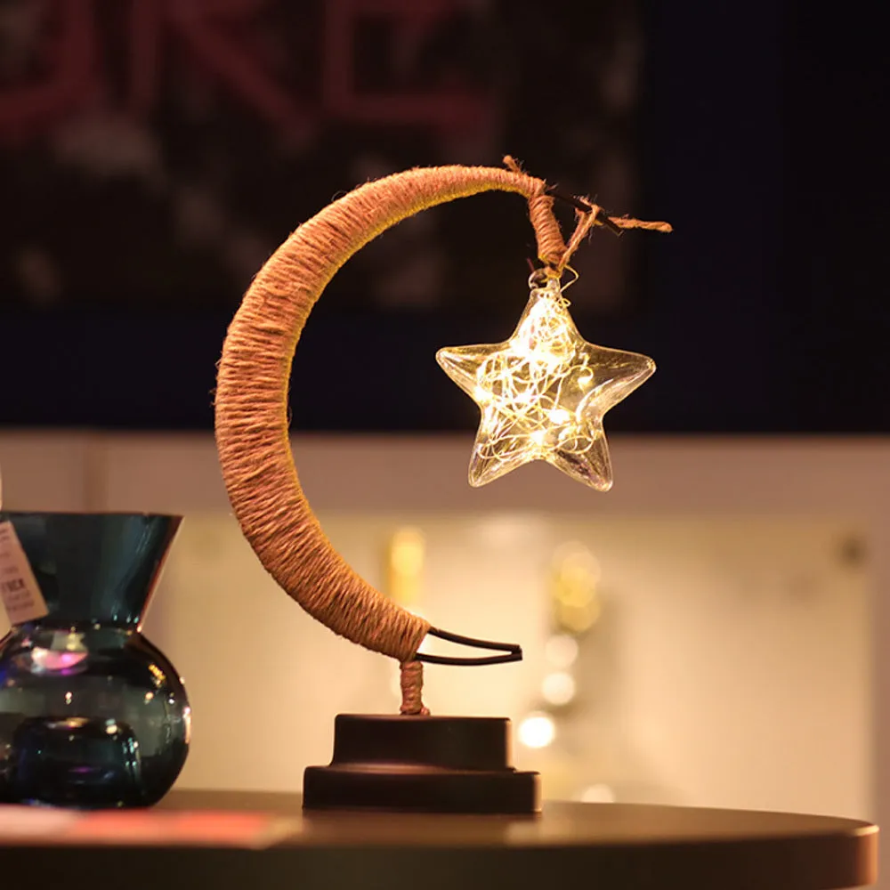 Warm white dimmable LED modelling light in apple shape with 10 beads on a wooden table