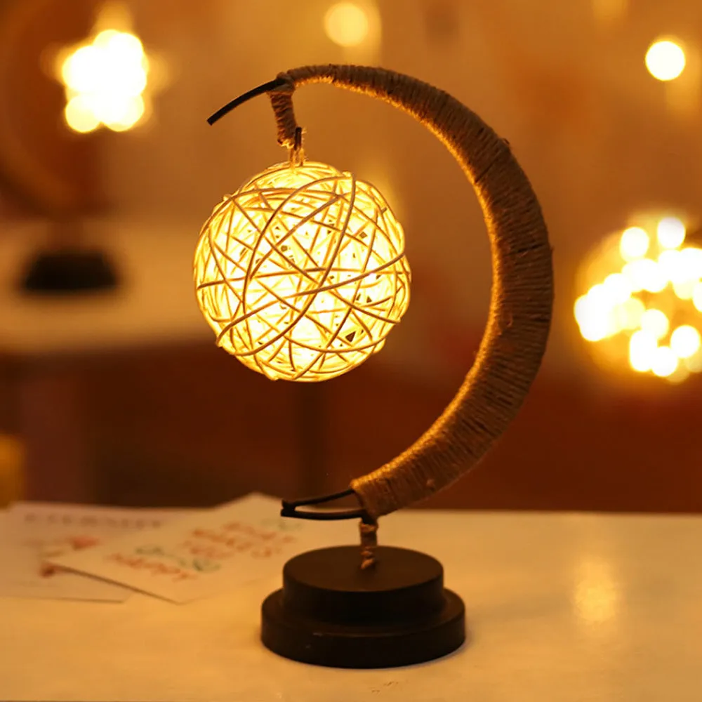 Warm white dimmable LED modelling light in apple shape with 10 beads on a wooden table