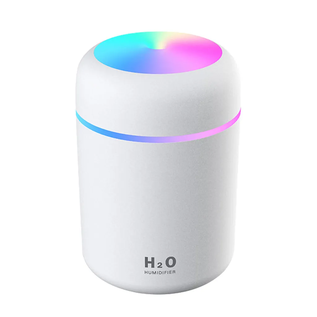 Ultrasonic aromatherapy essential oil diffuser with 300ml water tank and coloured night lights, compact for home or office use