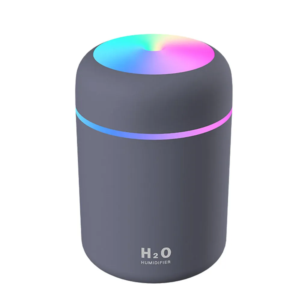 Ultrasonic aromatherapy essential oil diffuser with 300ml water tank and coloured night lights, compact for home or office use