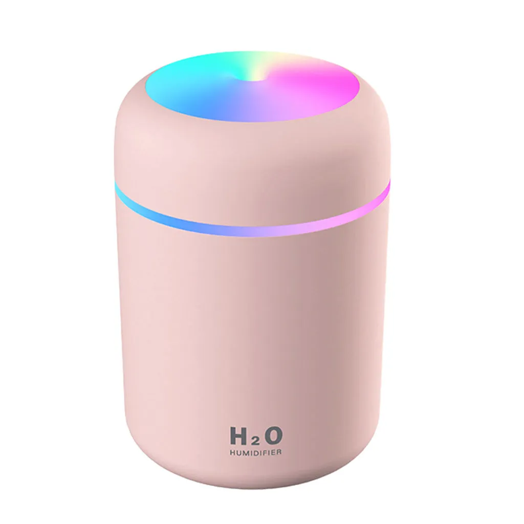 Ultrasonic aromatherapy essential oil diffuser with 300ml water tank and coloured night lights, compact for home or office use