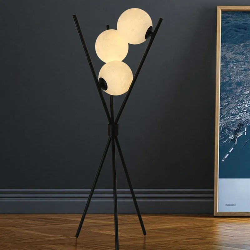 Scandinavian minimalist LED table lamp with iron body and acrylic shade, three tone light, on a wooden table