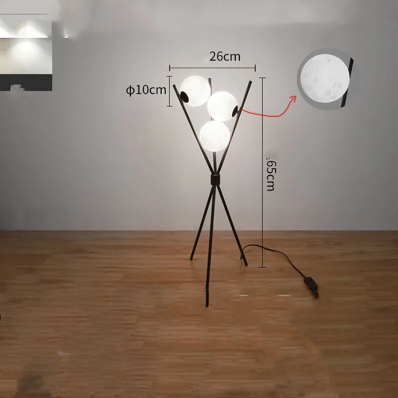 Scandinavian minimalist LED table lamp with iron body and acrylic shade, three tone light, on a wooden table