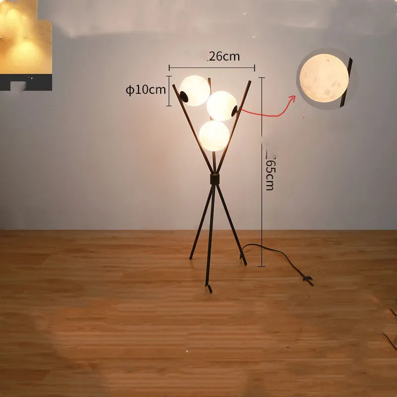 Scandinavian minimalist LED table lamp with iron body and acrylic shade, three tone light, on a wooden table