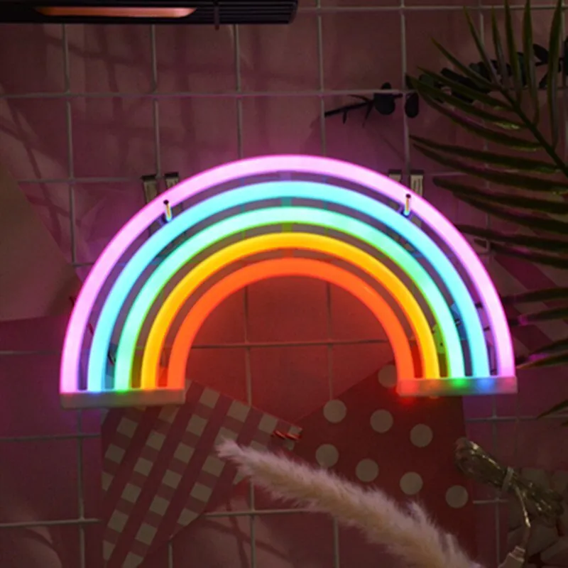 LED wall hanging rainbow neon light with compact 30x2x16cm housing on a wall