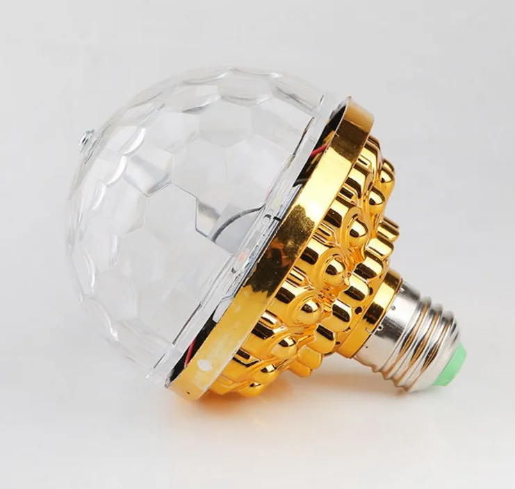 LED colourful rotating magic ball light with 6 RGB beads and lamp holder on a table