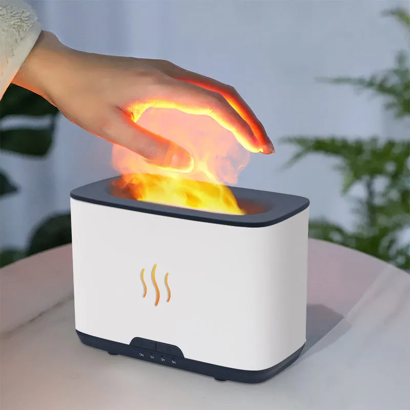 New Flame 300ml ultrasonic aromatherapy humidifier in white on a desktop with USB cable