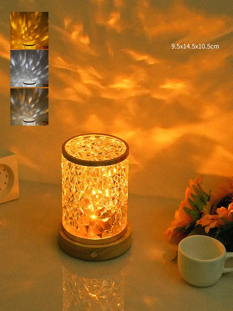 Rotating water ripple effect small night light on a solid wood base with USB cable