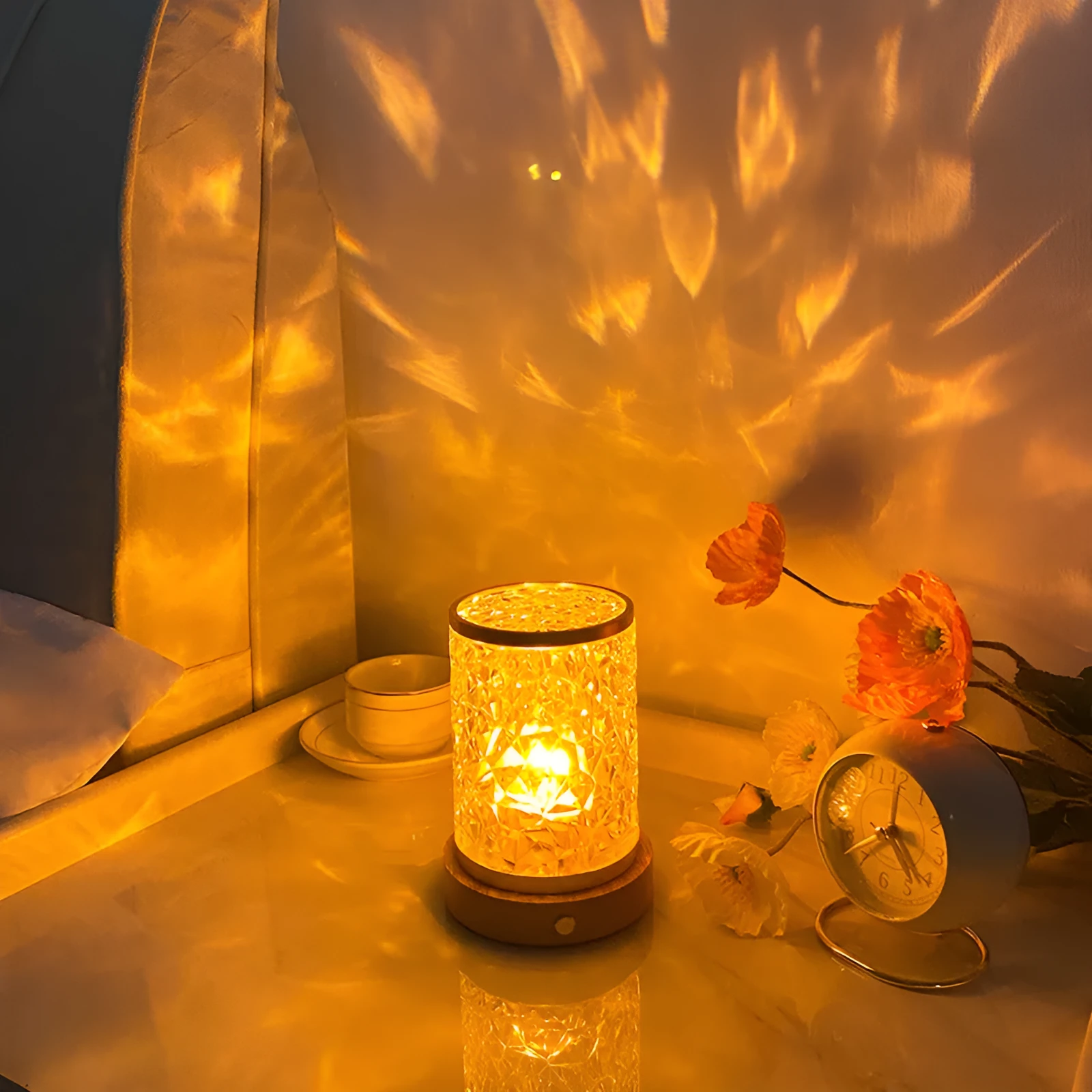 Rotating water ripple effect small night light on a solid wood base with USB cable