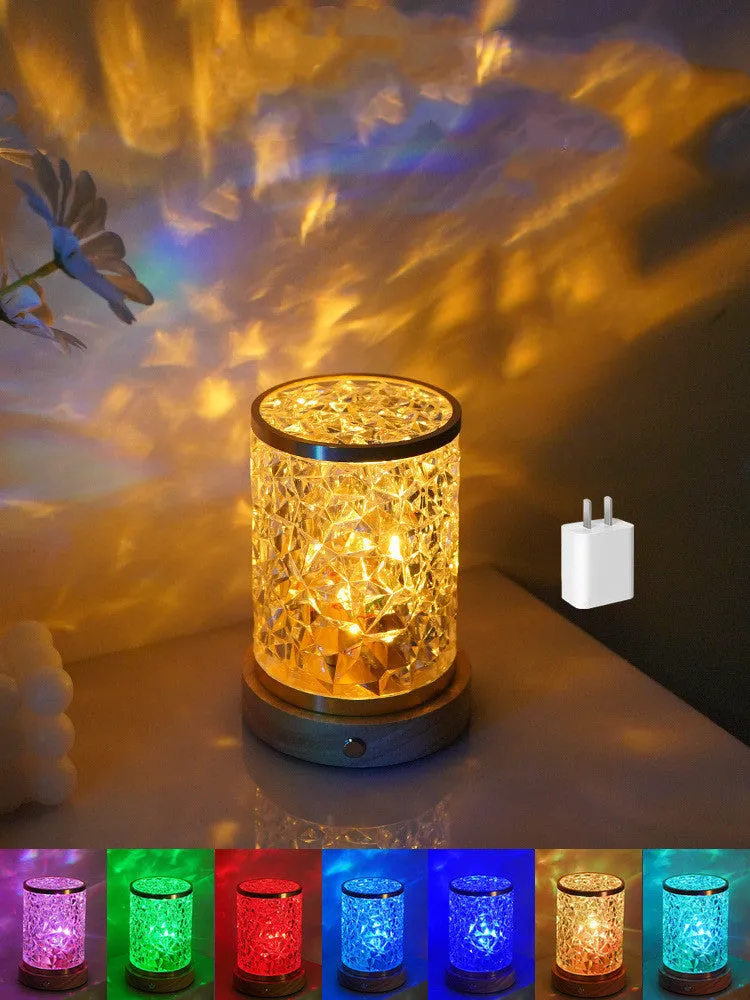 Rotating water ripple effect small night light on a solid wood base with USB cable