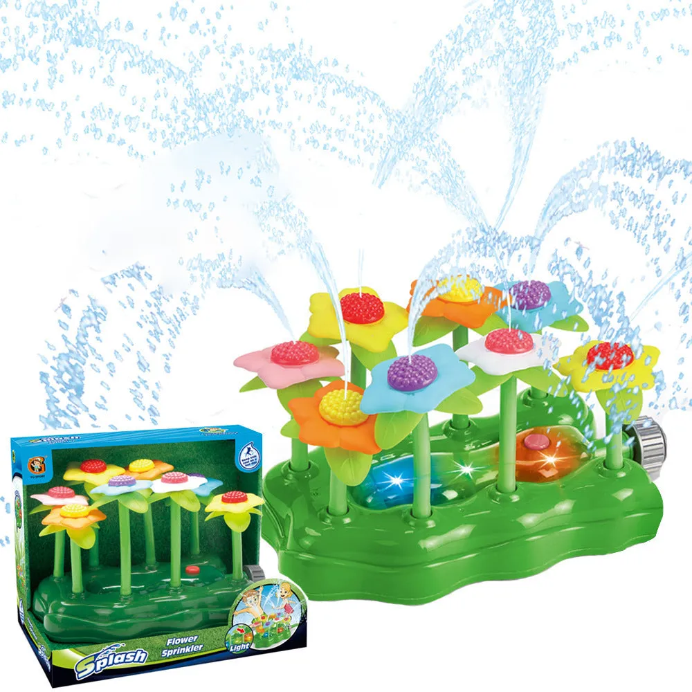 Cactus-shaped outdoor water sprinkler toy for kids on green grass with water spray