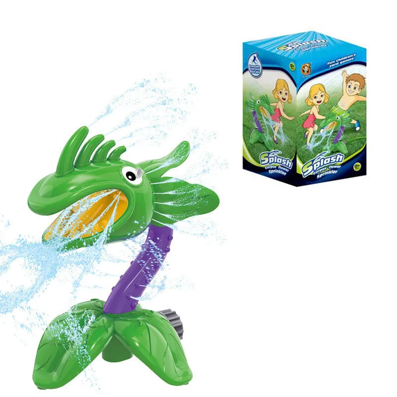 Cactus-shaped outdoor water sprinkler toy for kids on green grass with water spray