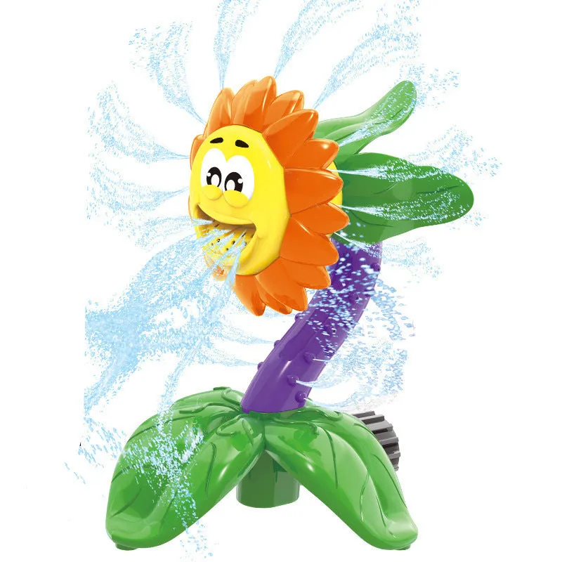 Cactus-shaped outdoor water sprinkler toy for kids on green grass with water spray