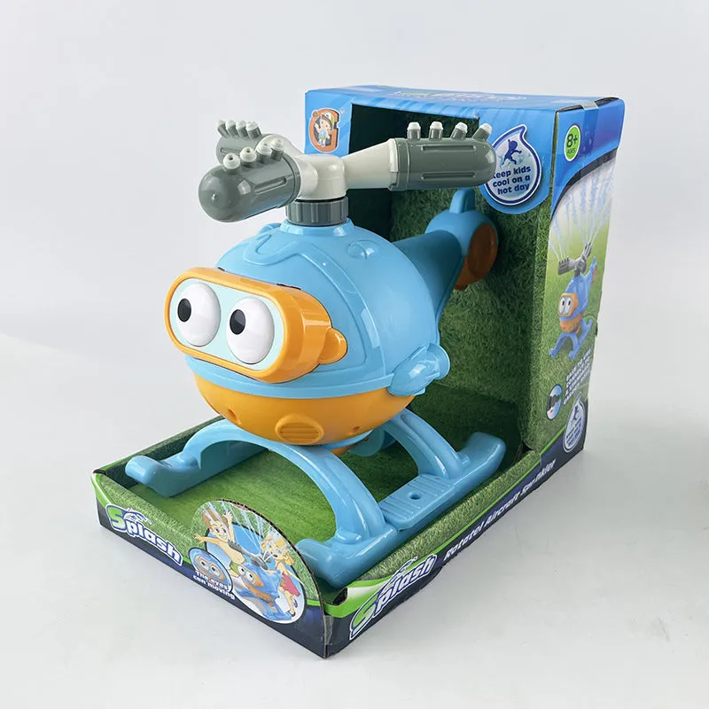 Cactus-shaped outdoor water sprinkler toy for kids on green grass with water spray
