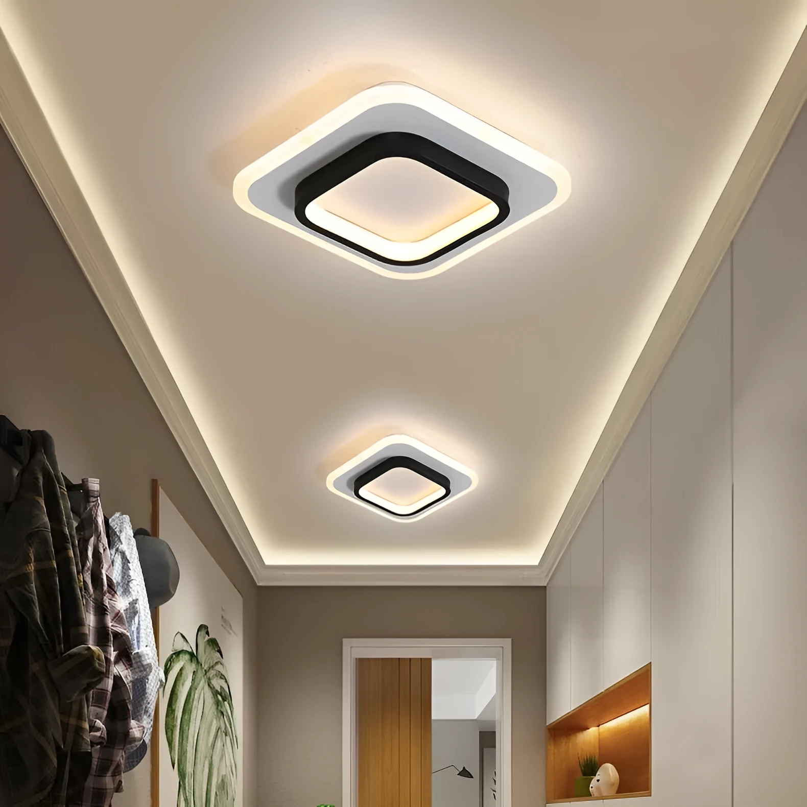 Black circular LED corridor light with aluminium and acrylic construction, 21cm diameter, for balcony or porch use