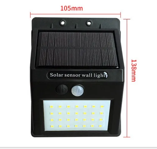 Solar sensor light with 20 LED beads and infrared sensor on a wall in outdoor setting