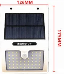 Solar sensor light with 20 LED beads and infrared sensor on a wall in outdoor setting