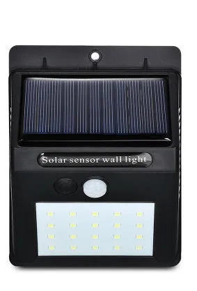 Solar sensor light with 20 LED beads and infrared sensor on a wall in outdoor setting
