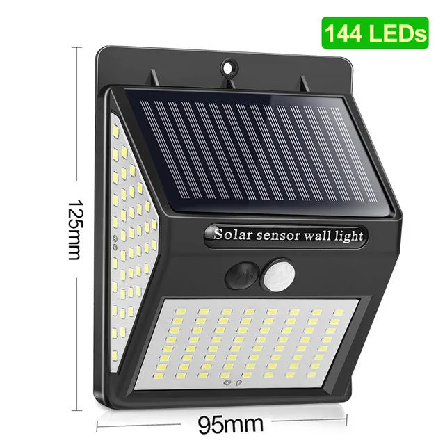 Solar sensor light with 20 LED beads and infrared sensor on a wall in outdoor setting
