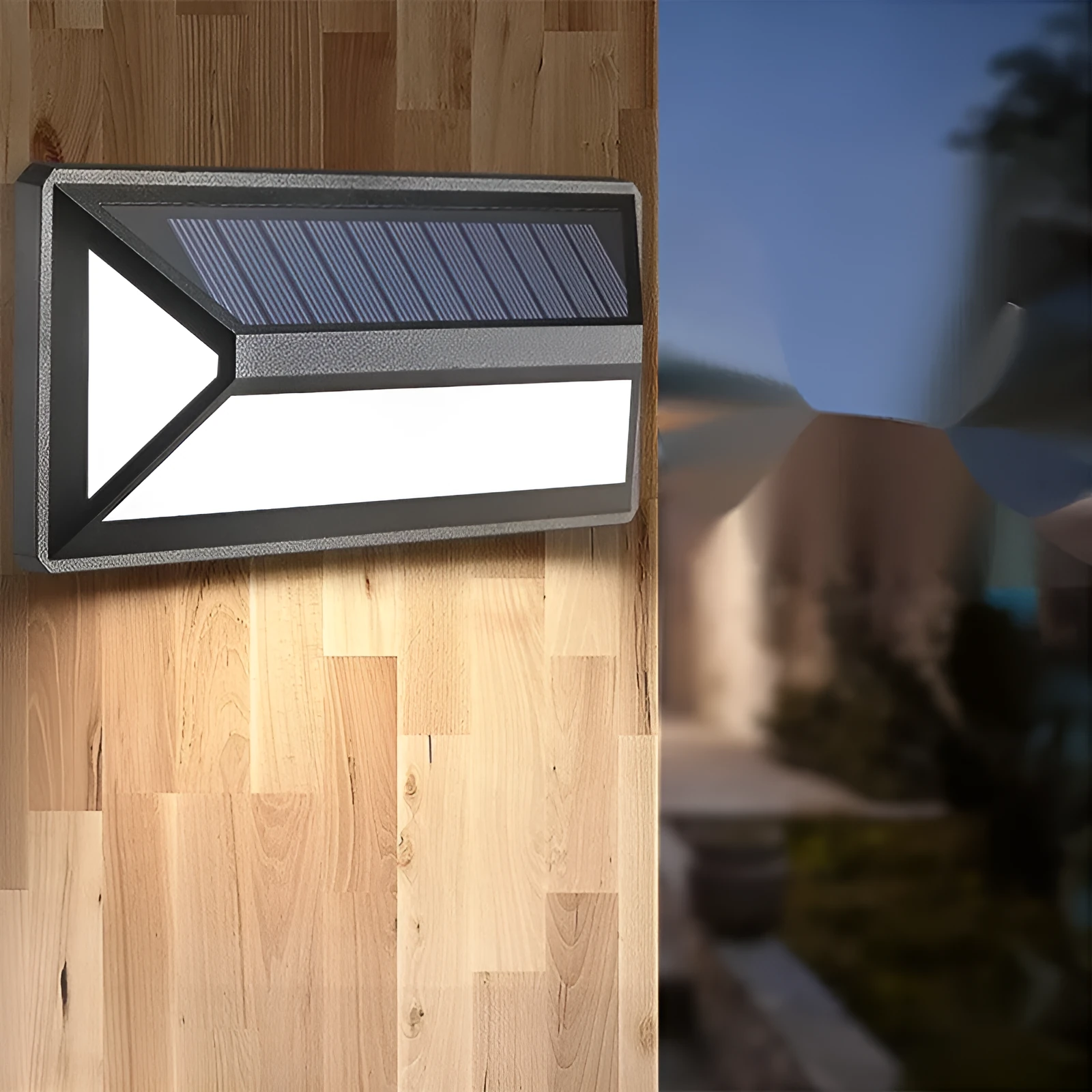 Black solar wall light with 33 LEDs, IP65 rated, measuring 166x75x30mm, mounted on an exterior wall