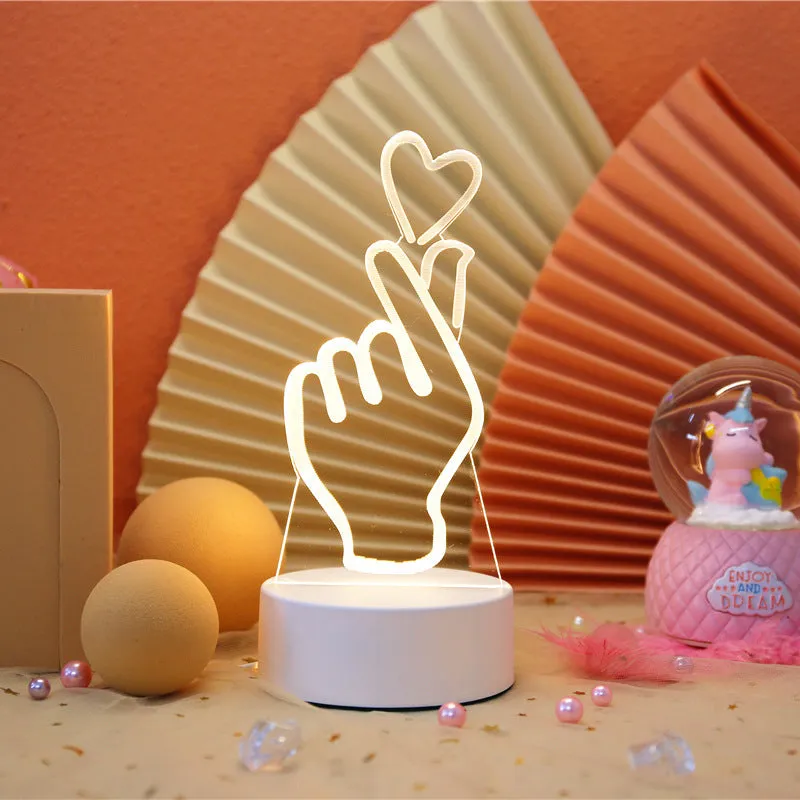 Creative electronic night light with acrylic light board showing USB cable, touch control, and three colour modes on a bedside table