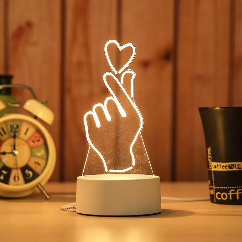 Creative electronic night light with acrylic light board showing USB cable, touch control, and three colour modes on a bedside table