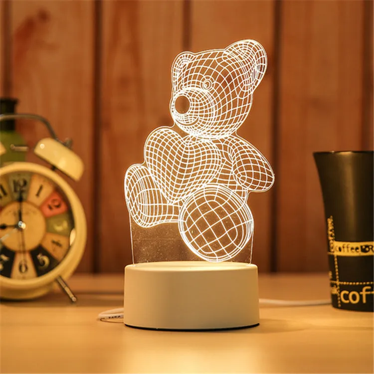 Creative electronic night light with acrylic light board showing USB cable, touch control, and three colour modes on a bedside table