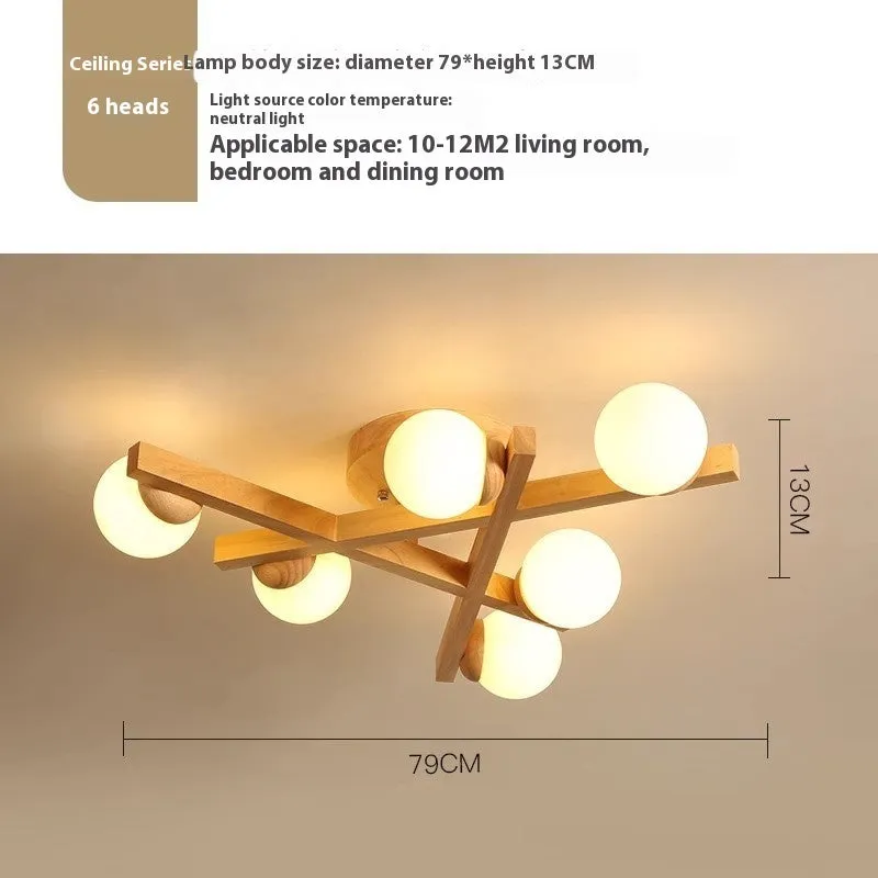 Nordic wooden-style ceiling light with three adjustable heads in a modern living room setting.