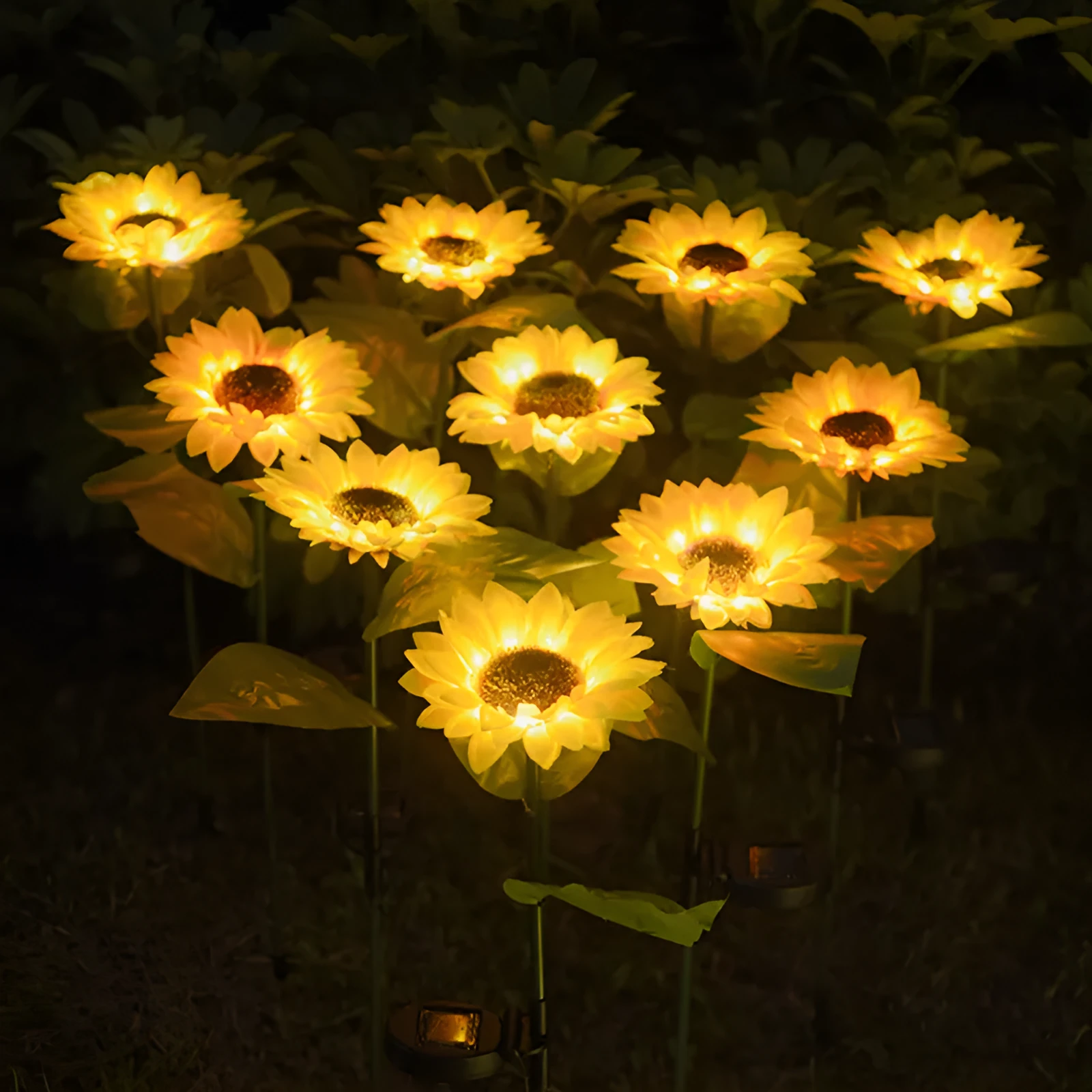 Set of LED solar sunflower garden lights with yellow Bujuan flower heads and stainless steel stems placed along a pathway