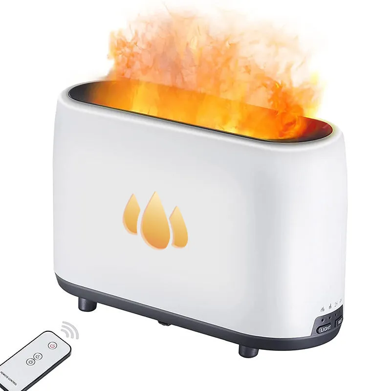White simulated flame aromatherapy humidifier on desk with mist and soft glow
