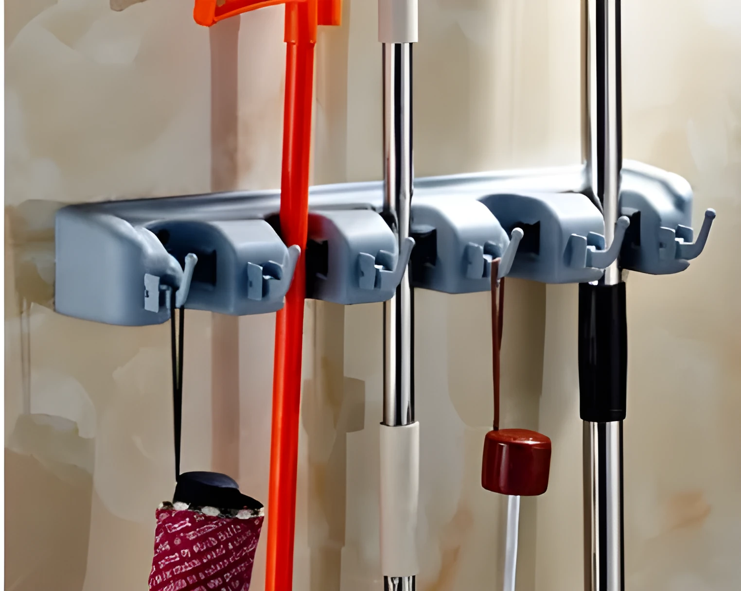 Plastic mop hook wall hanger with 4 hooks for drilling installation, holding a mop and broom