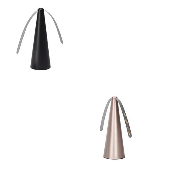 Fly repellent fan with ABS housing, 8.2x8.2x24cm, on a dining table