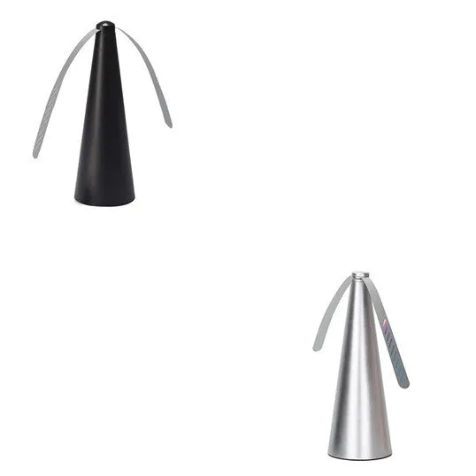 Fly repellent fan with ABS housing, 8.2x8.2x24cm, on a dining table