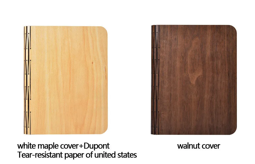 Walnut wooden book light open with colour changing LED pages on a desk