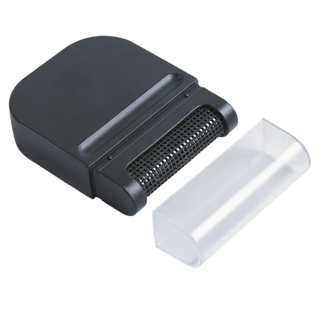 Manual fuzz remover brush with removable catching net for clothes and sofas, compact plastic design